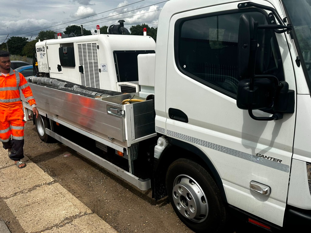 Mitsubishi Fuso Pump Cleanout - Concrete Pump Hire Watford