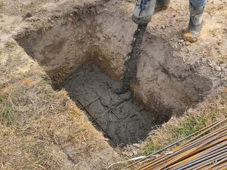 Commercial foundation concrete pour with steel reinforcement in Watford